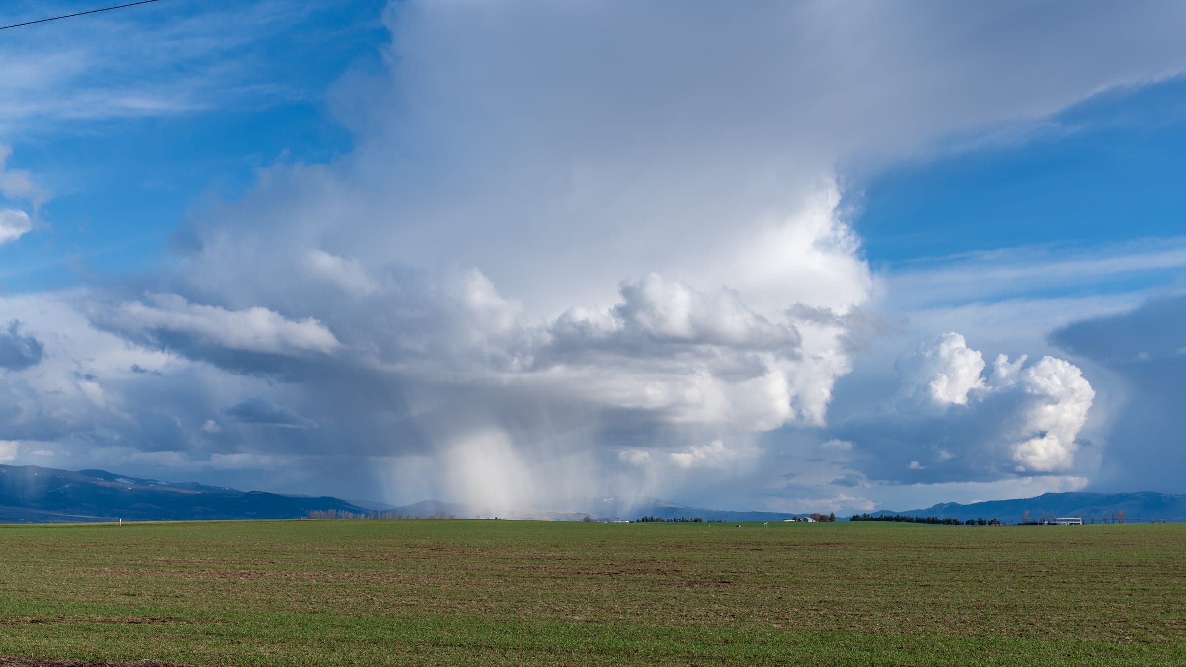 Storm clouds descending into the valley