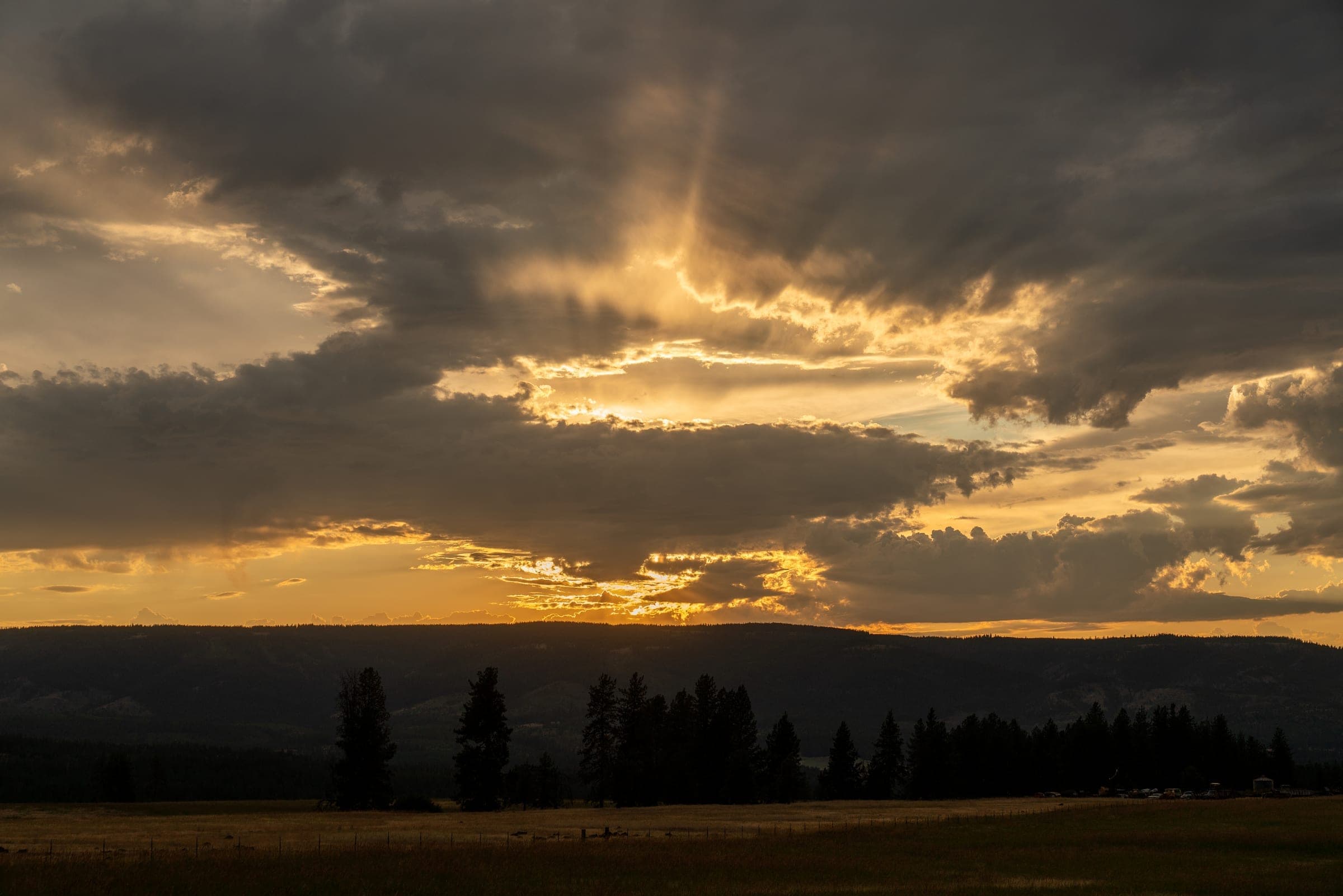 Rich sunset colors reflecting off valley clouds