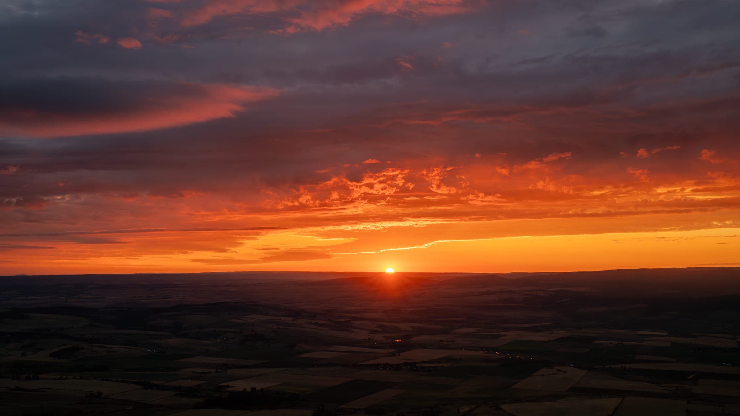 Sunburst breaking over Indian Rock at sunrise